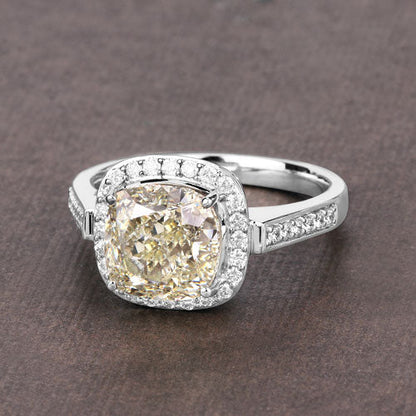 IGI Certified 4.02 Carat Genuine Light Yellow Diamond Center and 0.36cttw White Diamond 18K White Gold Ring (4.38cttw) Bids.com