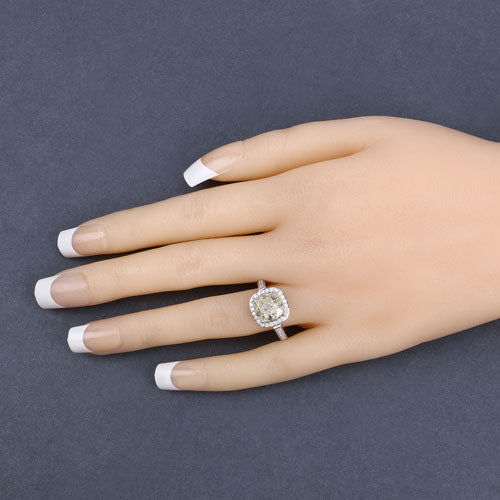 IGI Certified 4.02 Carat Genuine Light Yellow Diamond Center and 0.36cttw White Diamond 18K White Gold Ring (4.38cttw) Bids.com