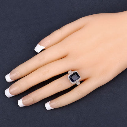 4.80 Carat Glass Filled Sapphire and White Topaz .925 Sterling Silver Ring Bids.com